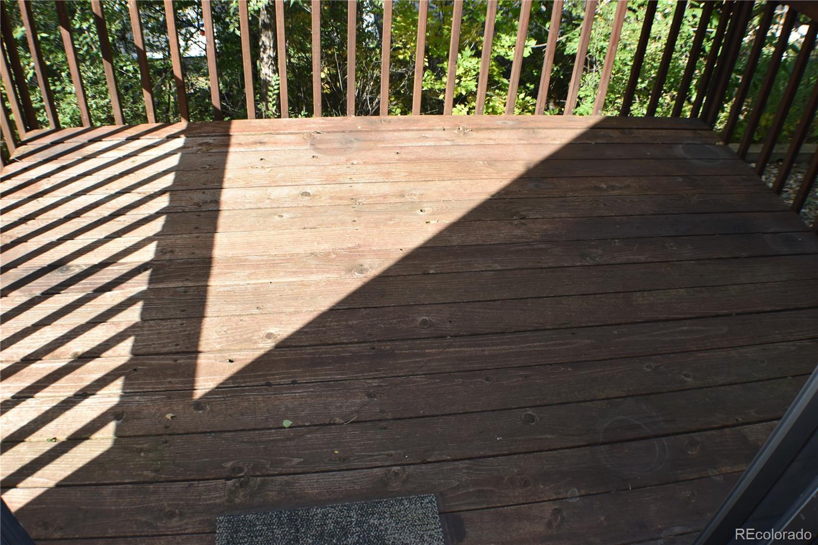 1322 Talley Circle Colorado Springs, CO 80904 - Photo 15 of 32 a view of outdoor space with wooden floor
