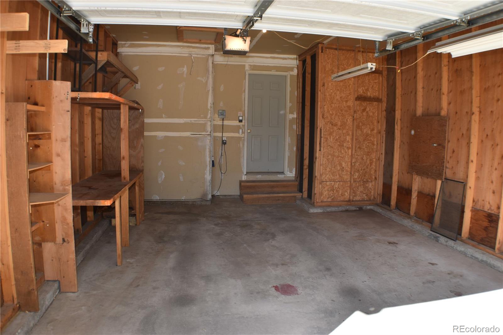 1322 Talley Circle Colorado Springs, CO 80904 - Photo 30 of 32 a view of entryway with wooden walls