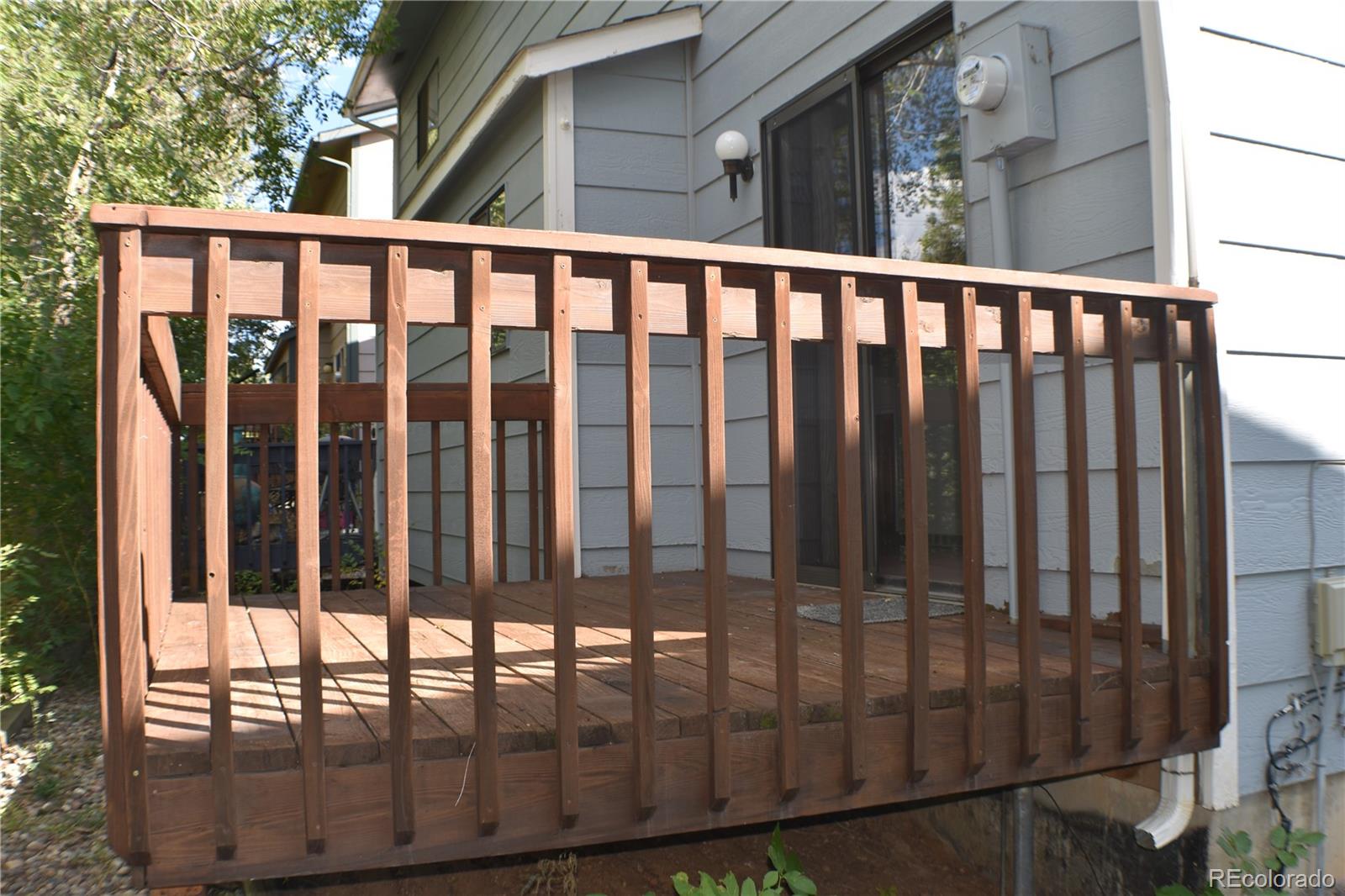 1322 Talley Circle Colorado Springs, CO 80904 - Photo 31 of 32 a view of a brick house with a window