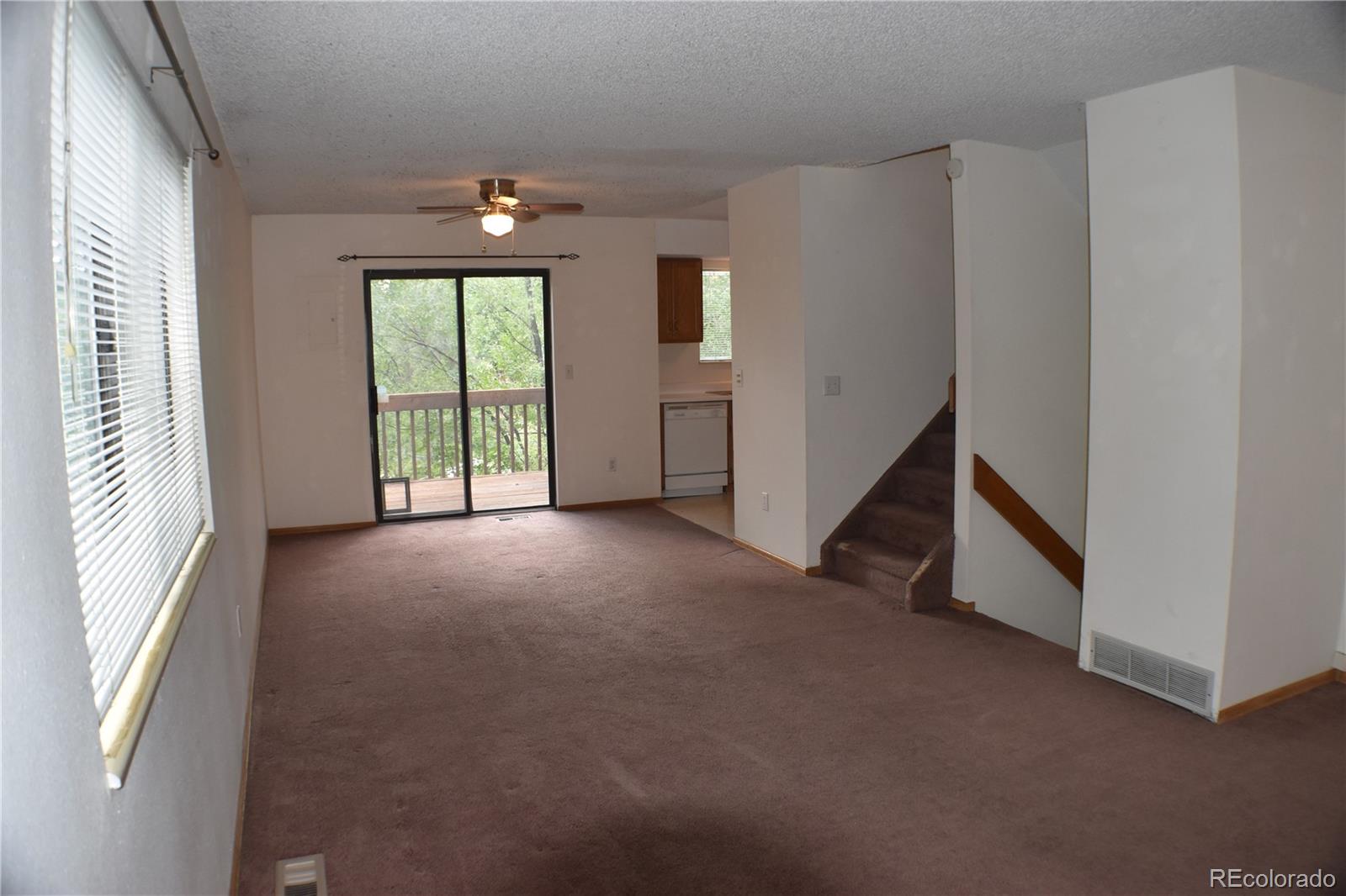 1322 Talley Circle Colorado Springs, CO 80904 - Photo 8 of 32 a view of empty room with window