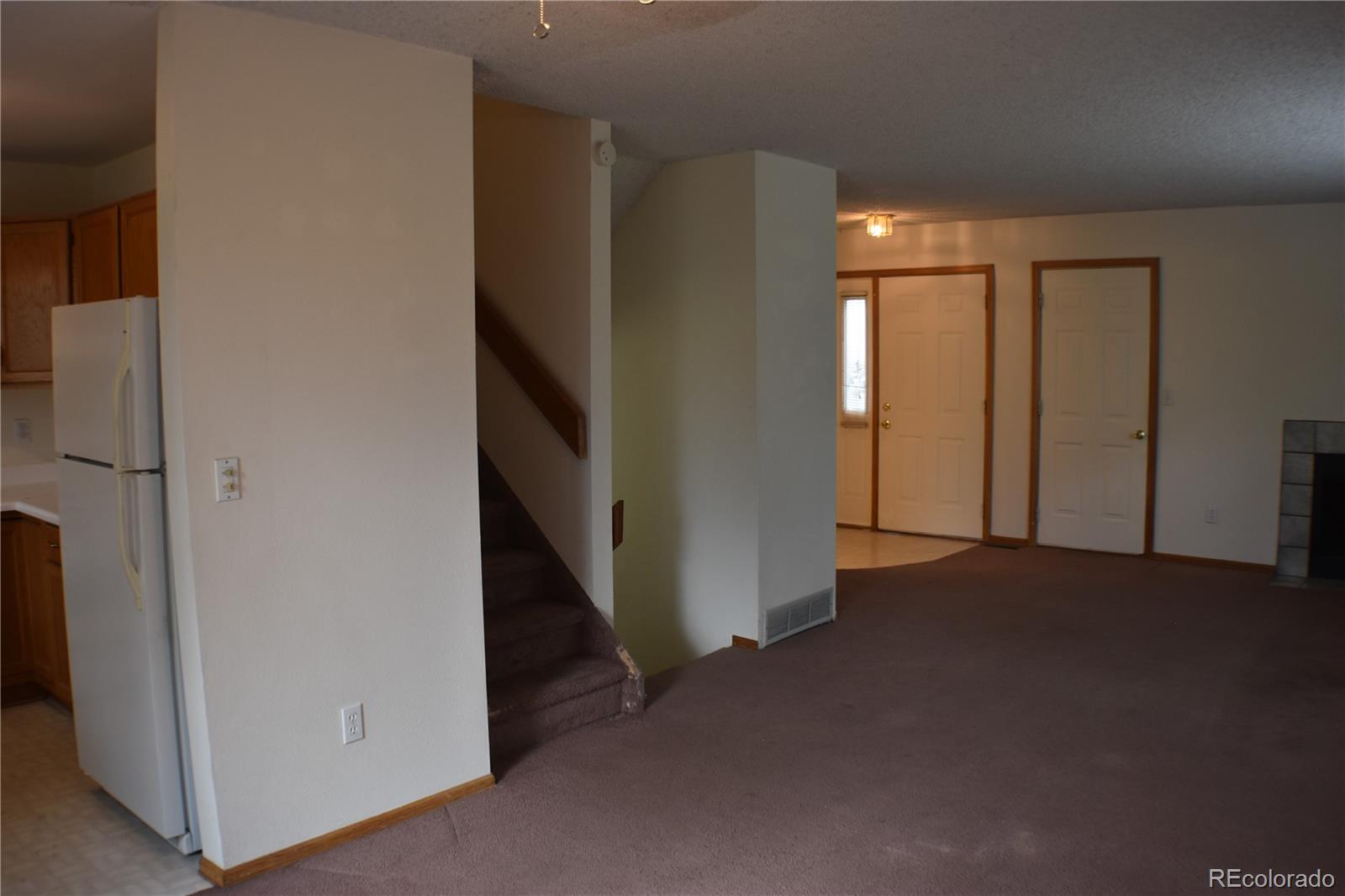 1322 Talley Circle Colorado Springs, CO 80904 - Photo 10 of 32 a view of a hallway with entryway