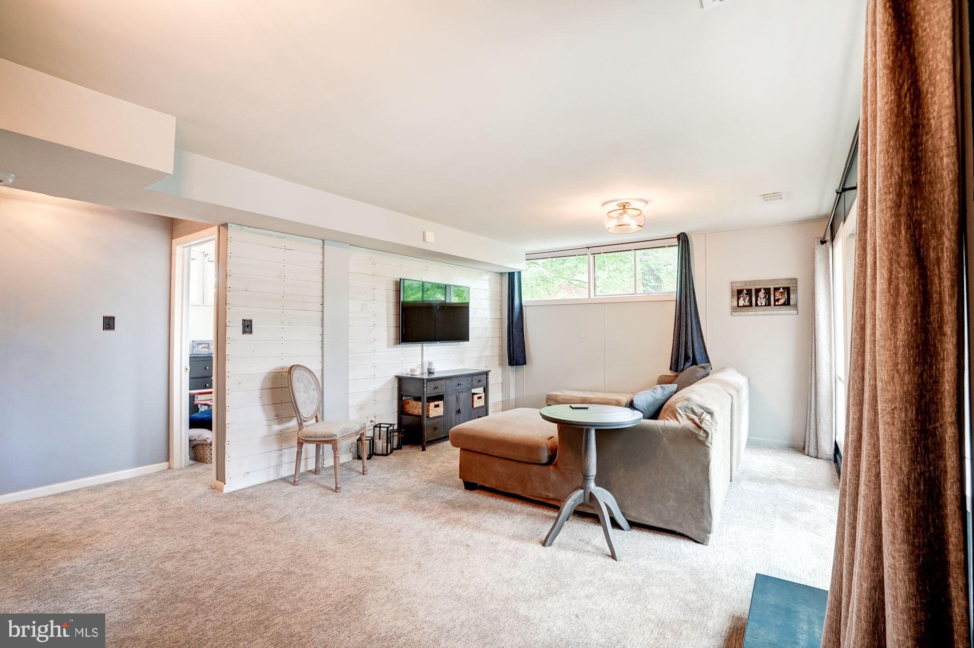 6718 Old Chesterbrook Road McLean, VA 22101 - Photo 19 of 25 Family room w/gorgeous accent wall