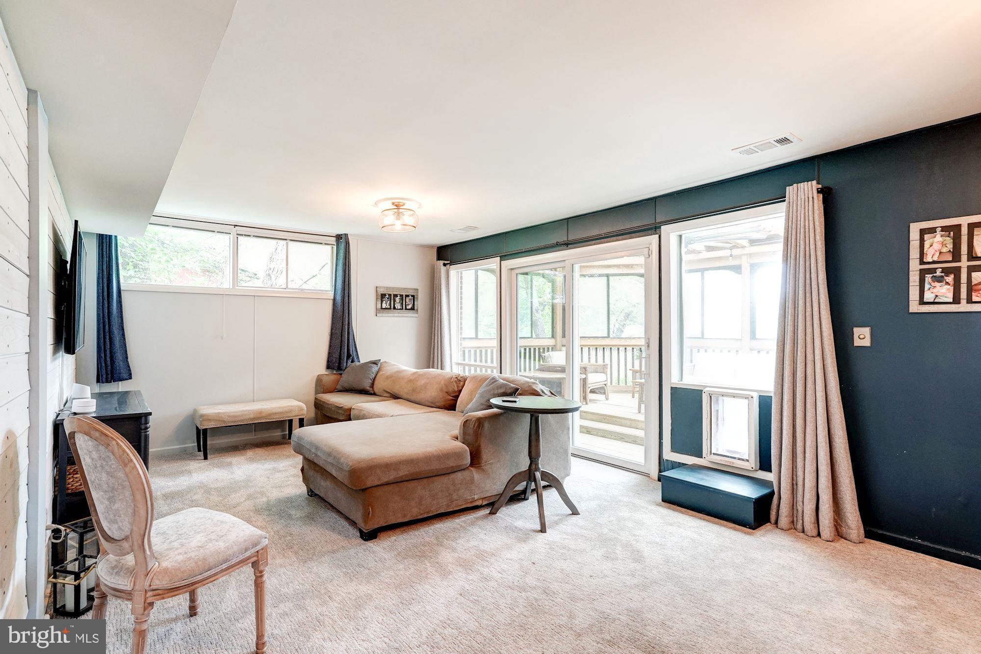 6718 Old Chesterbrook Road McLean, VA 22101 - Photo 20 of 25 Family room w/entry to sun room/3 season porch