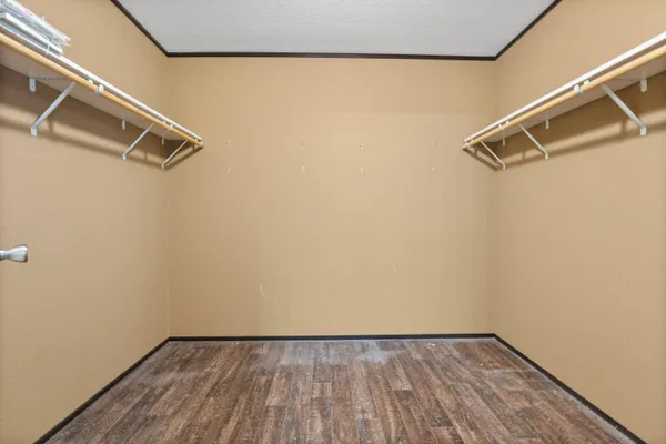 a view of a room with racks on the wall