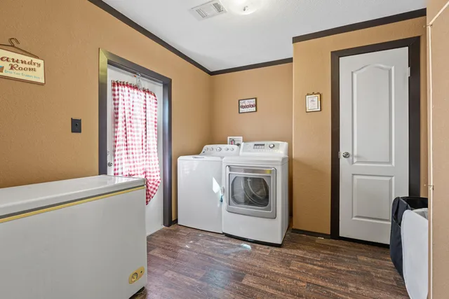 a utility room with dryer and washer