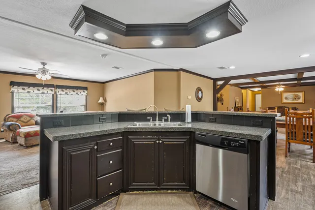 a kitchen with a sink and cabinets