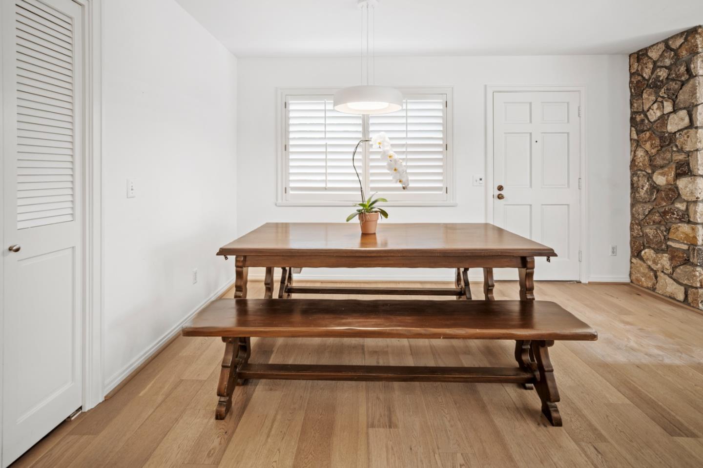 0 Northeast Ne Corner, Unit 1 Carmel, CA 93923 - Photo 17 of 33 a view of a room with a table and windows