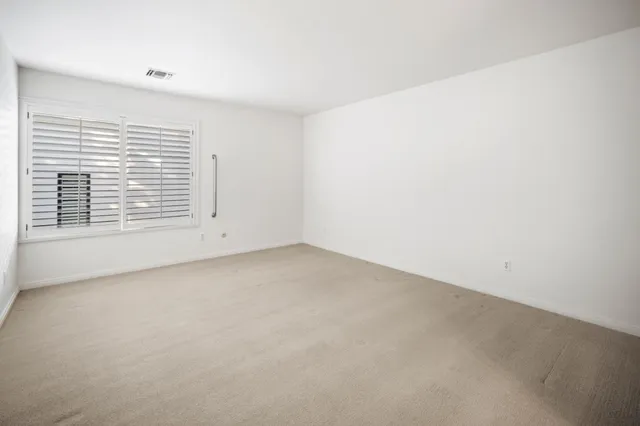 a view of a room that has a window in it