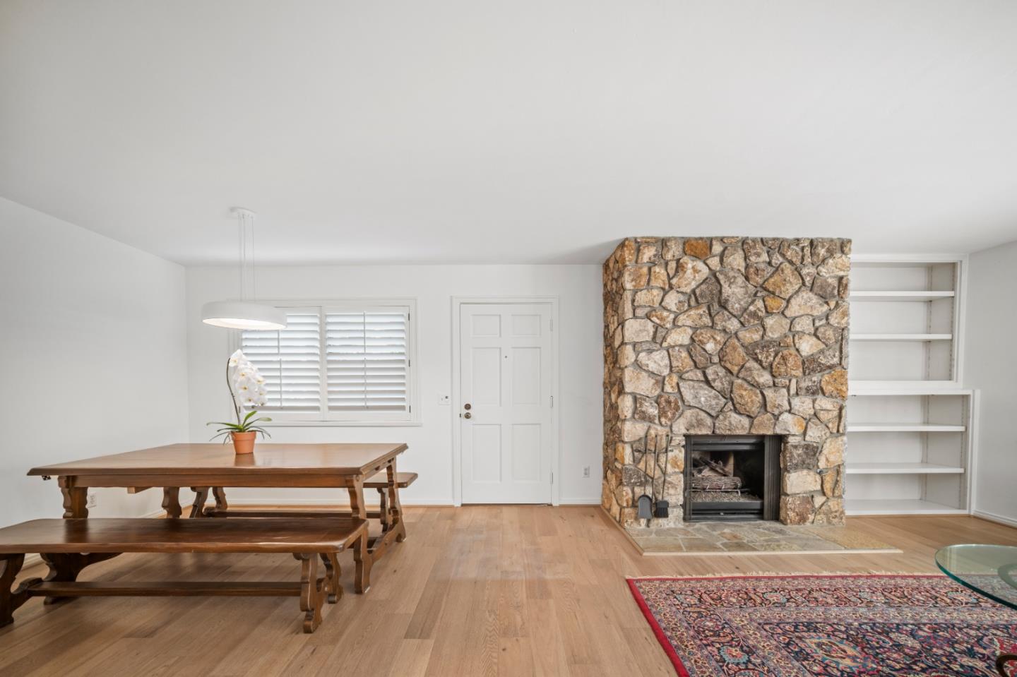 0 Northeast Ne Corner, Unit 1 Carmel, CA 93923 - Photo 9 of 33 a living room with a couch and a fireplace