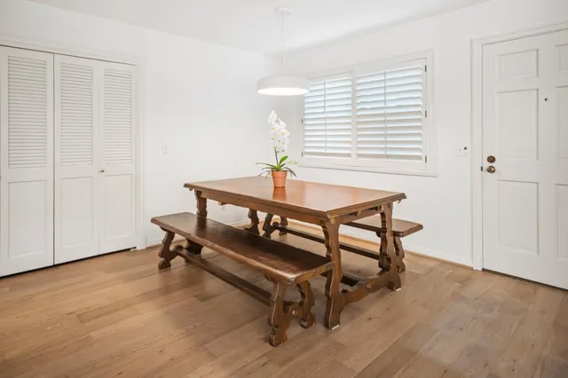 a reading room with furniture and a window