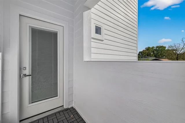 a view of a backyard of the house