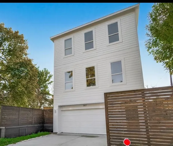 a view of a house with a garage
