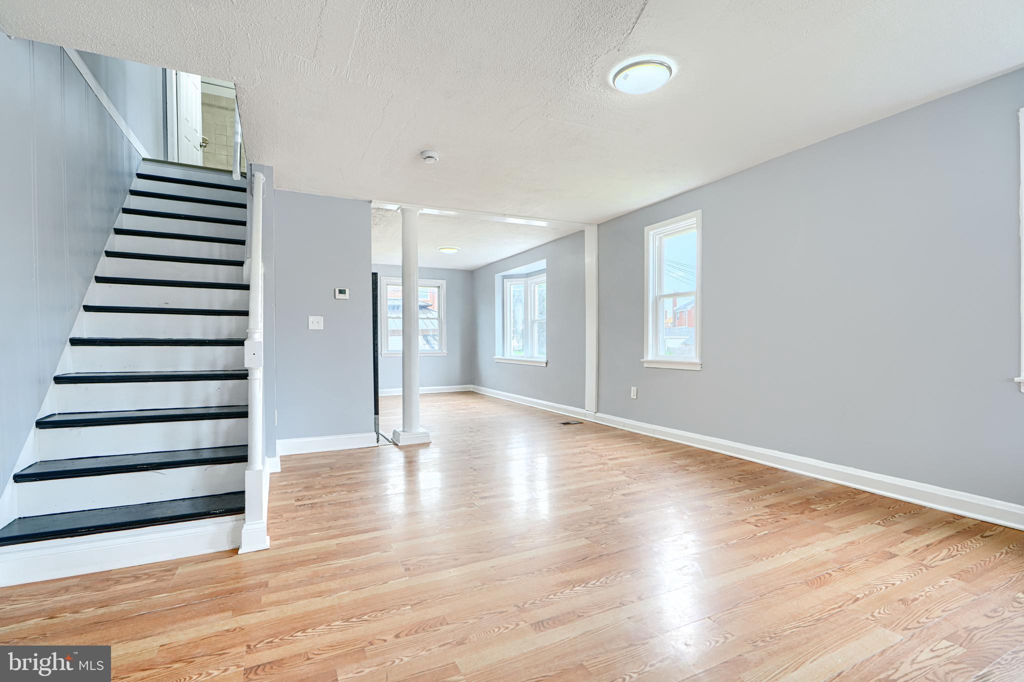 1902 Kelmore Road Baltimore, MD 21222 - Photo 2 of 27 LIVING ROOM w/NEW FLOORING