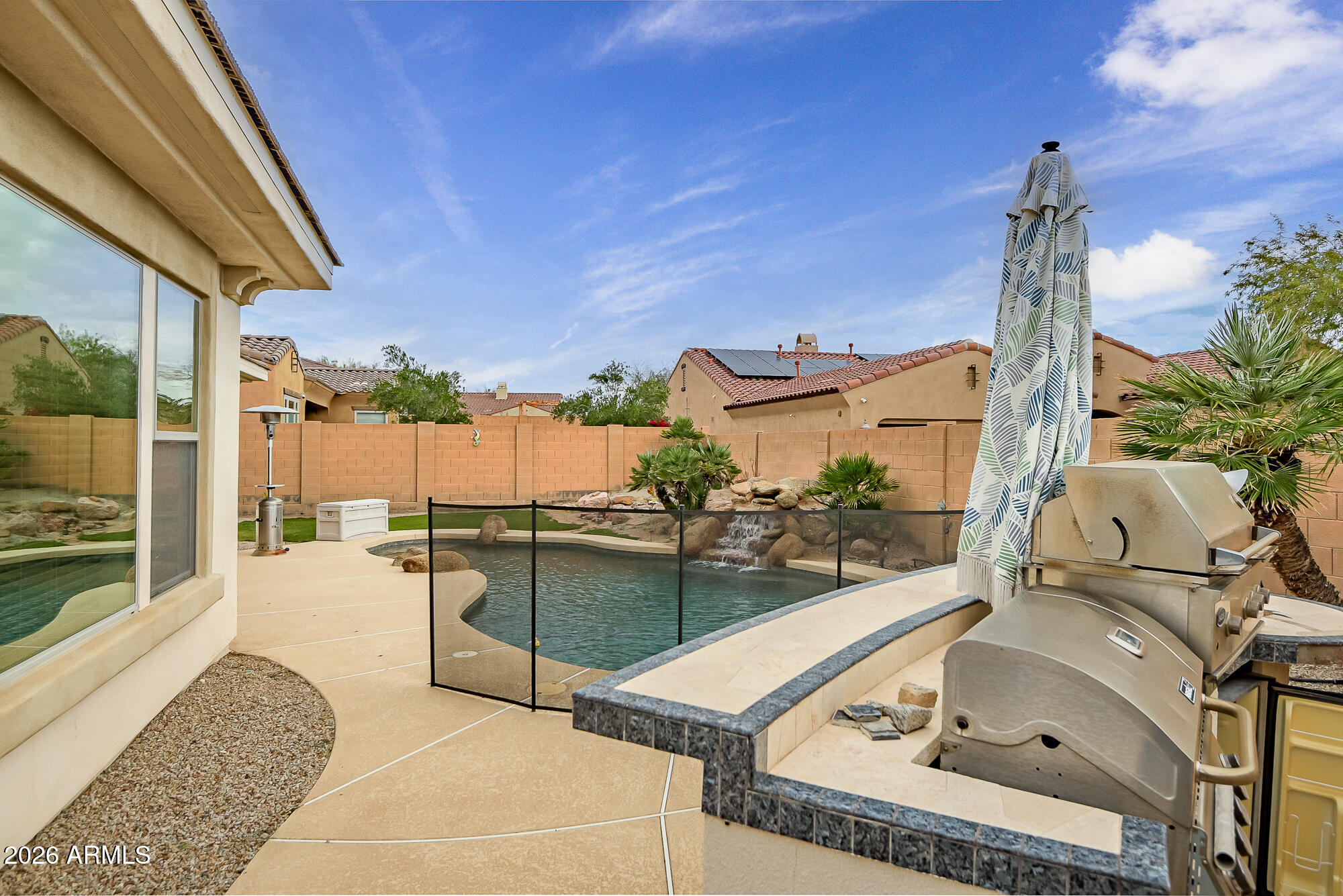 18179 West Narramore Road Goodyear, AZ 85338 - Photo 34 of 37 Backyard Kitchen