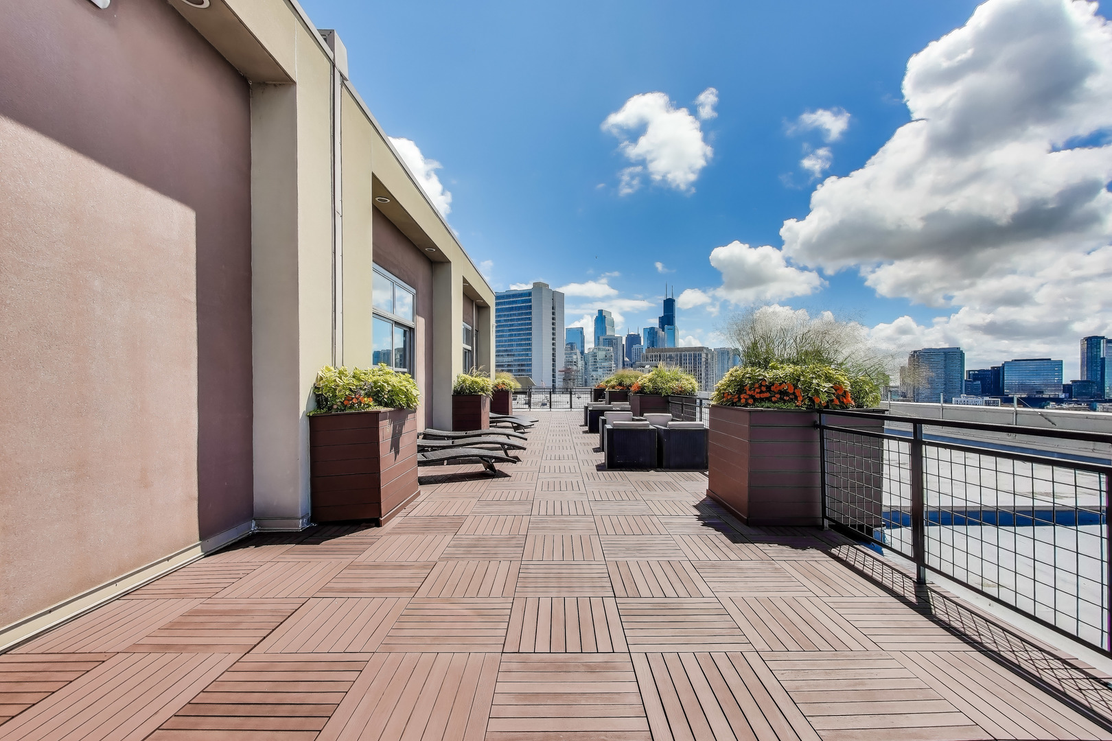 900 North Kingsbury Street, Unit 1019 Chicago, IL 60610 - Photo 24 of 37 a view of a balcony with dining table and chairs