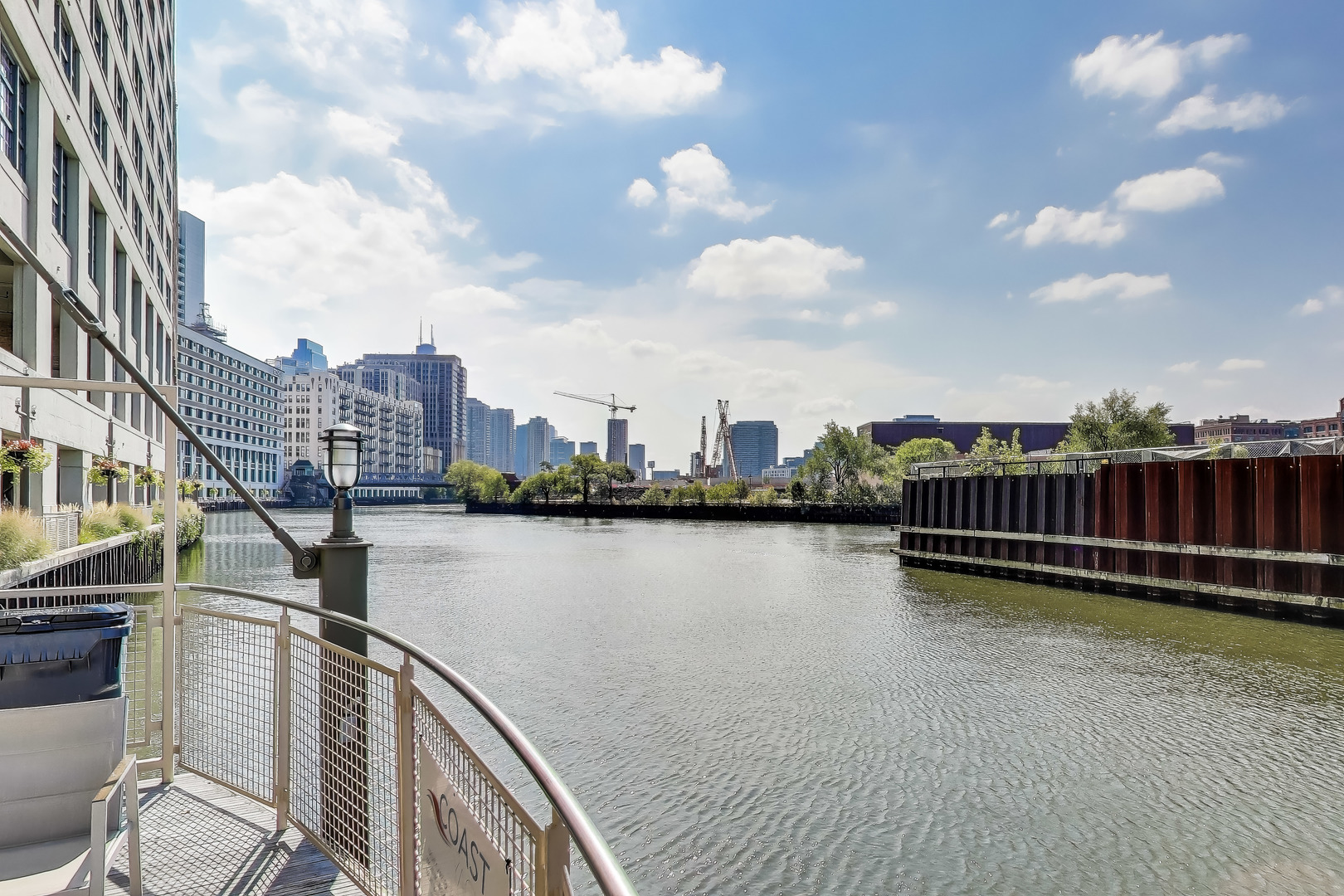 900 North Kingsbury Street, Unit 1019 Chicago, IL 60610 - Photo 35 of 37 a view of a lake with city skyline in the background