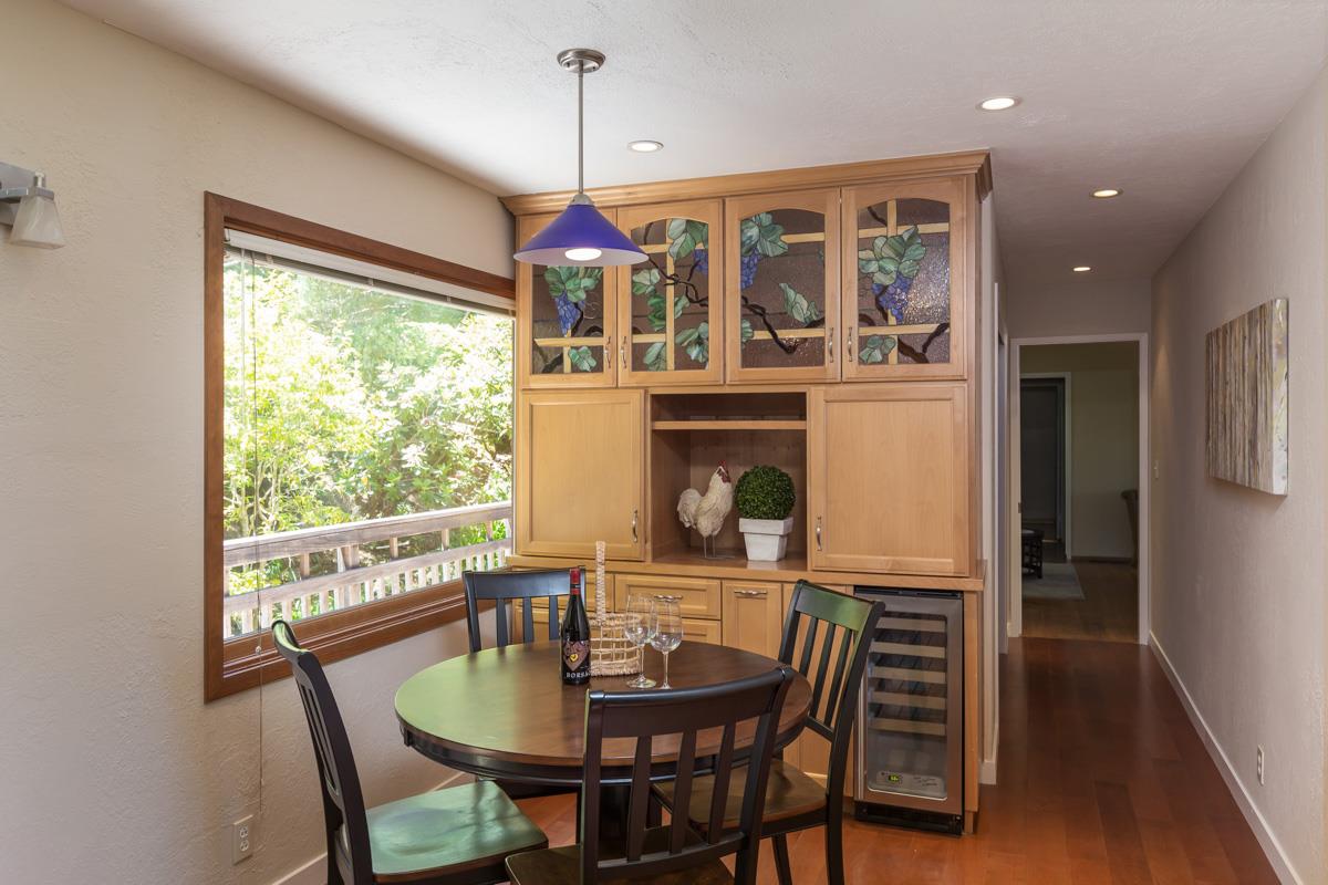 730 Patrol Road Woodside, CA 94062 - Photo 8 of 29 a dining room with furniture window wooden floor