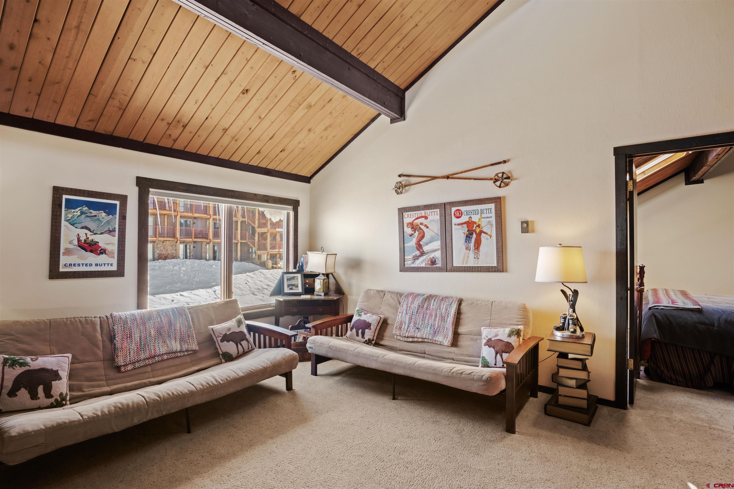 16 Hunter Hill Road, Unit K303 Crested Butte, CO 81225 - Photo 17 of 33 a living room with furniture and a bathtub