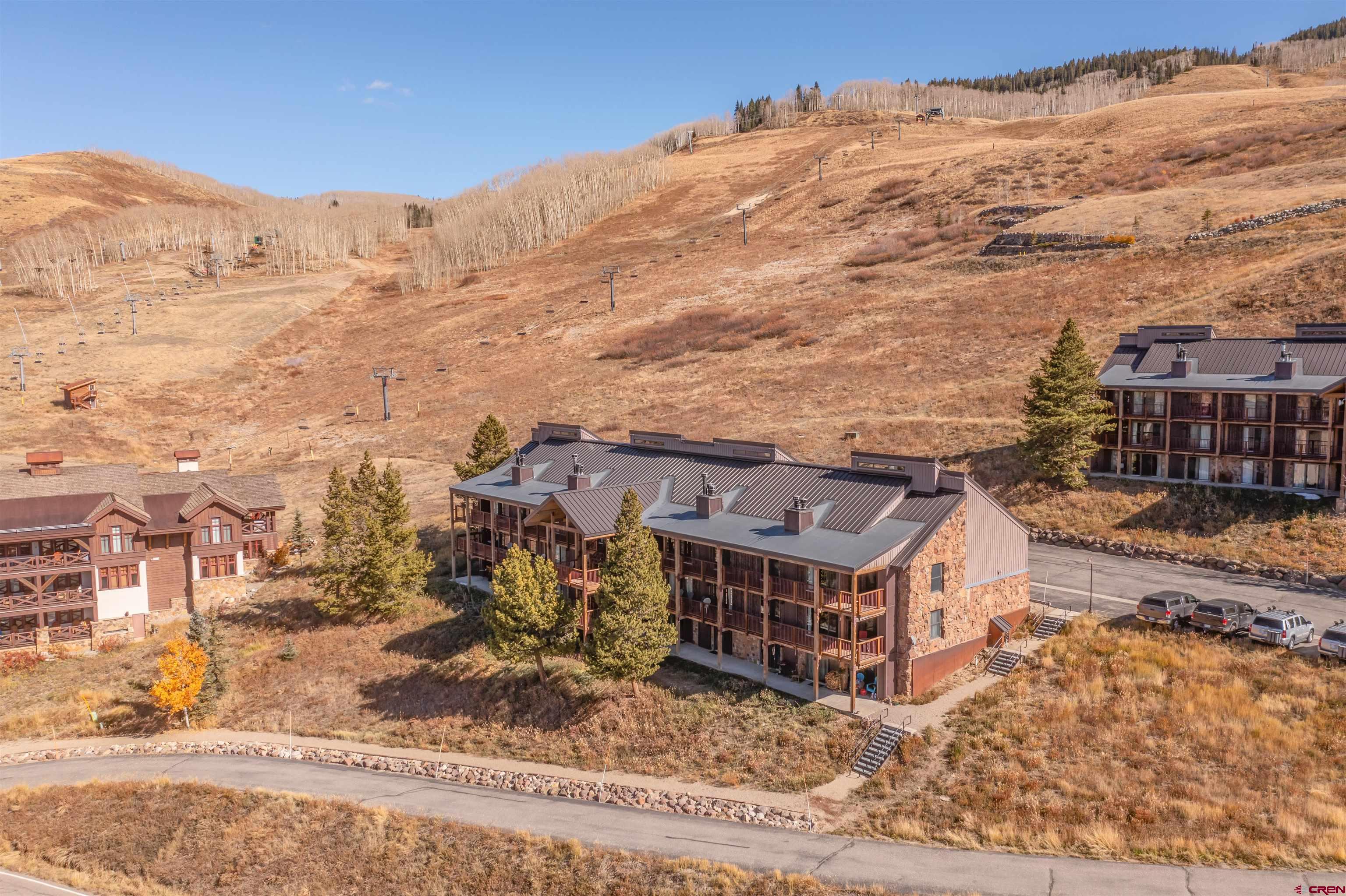 16 Hunter Hill Road, Unit K303 Crested Butte, CO 81225 - Photo 28 of 33 a city view with tall buildings