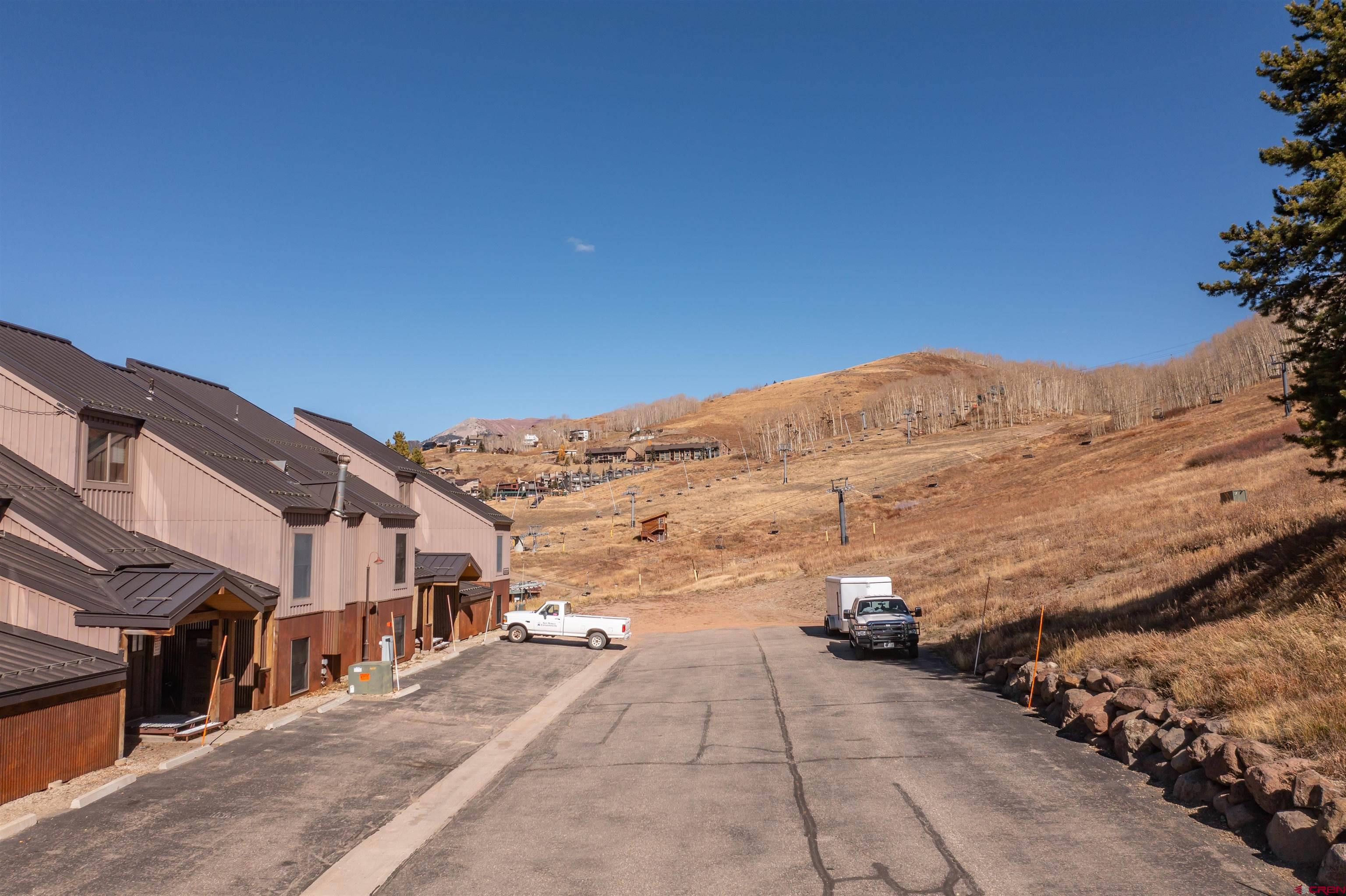 16 Hunter Hill Road, Unit K303 Crested Butte, CO 81225 - Photo 31 of 33 a view of a road with a big yard