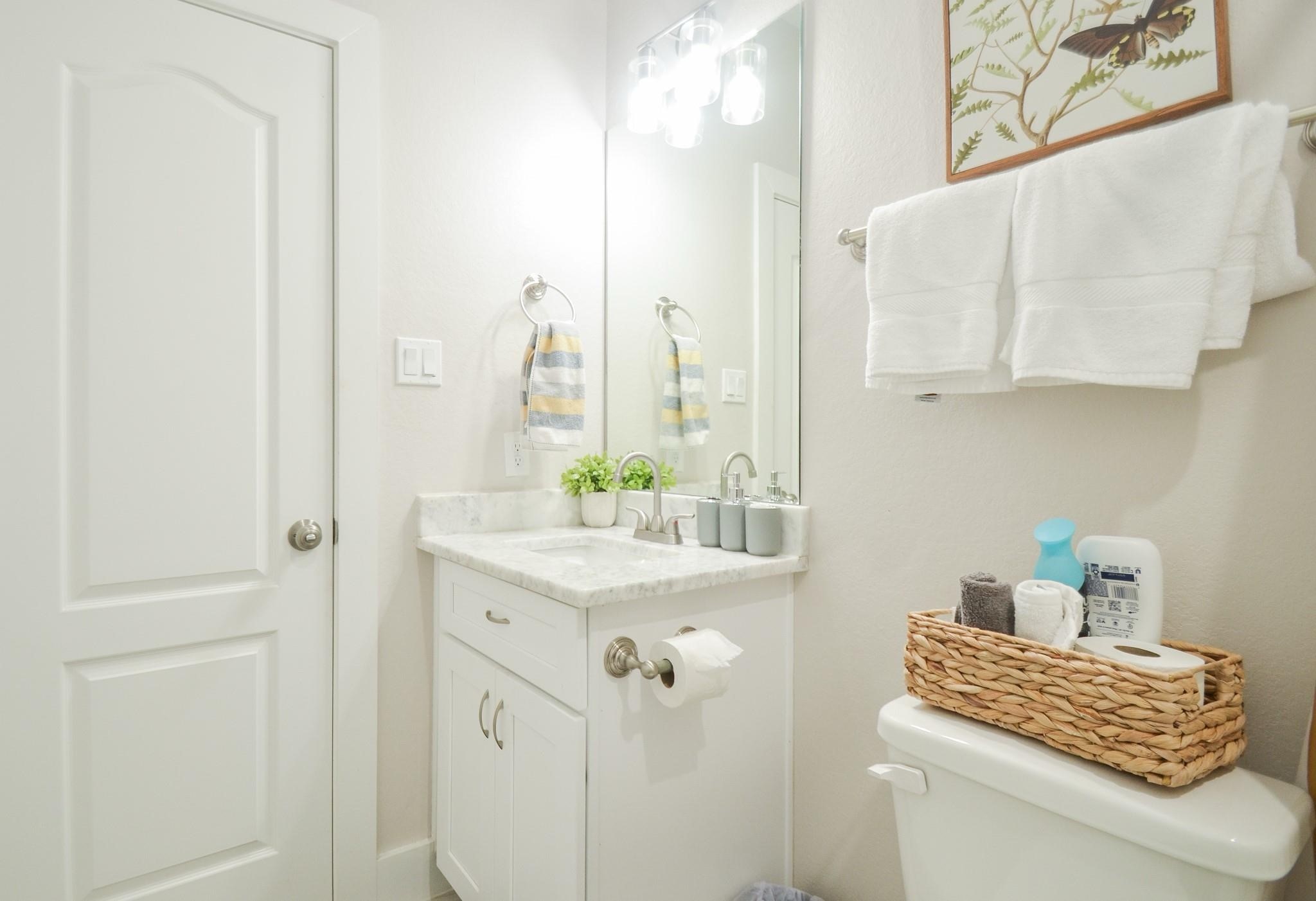 4511 Reed Road, Unit A Houston, TX 77051 - Photo 19 of 34 a bathroom with a sink a mirror and a shower