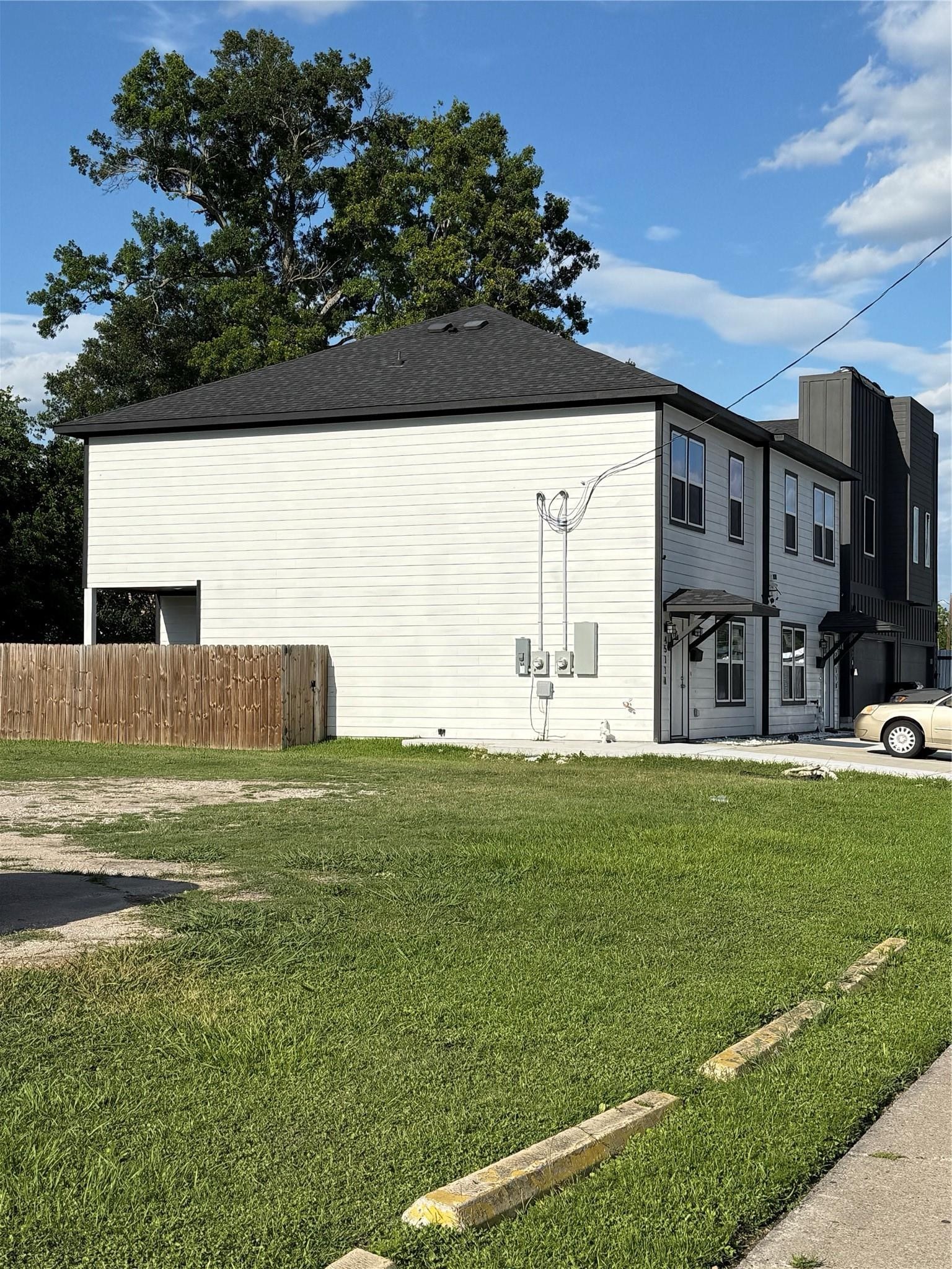 4511 Reed Road, Unit A Houston, TX 77051 - Photo 32 of 34 a view of a big yard with a large tree