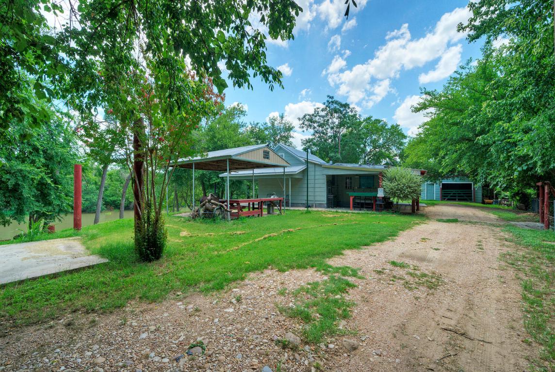 906-828 Water Street Manor, TX 78653 - Photo 23 of 40 a view of a patio with a yard