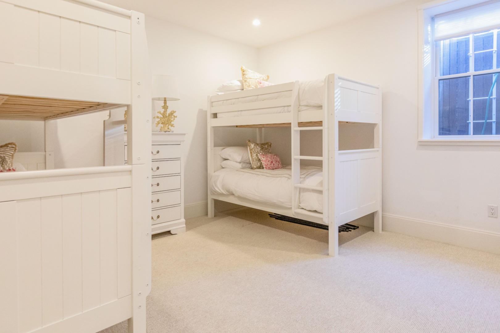 2 Wood Lily Road Nantucket, MA 02554 - Photo 28 of 38 a bedroom with furniture and white walls