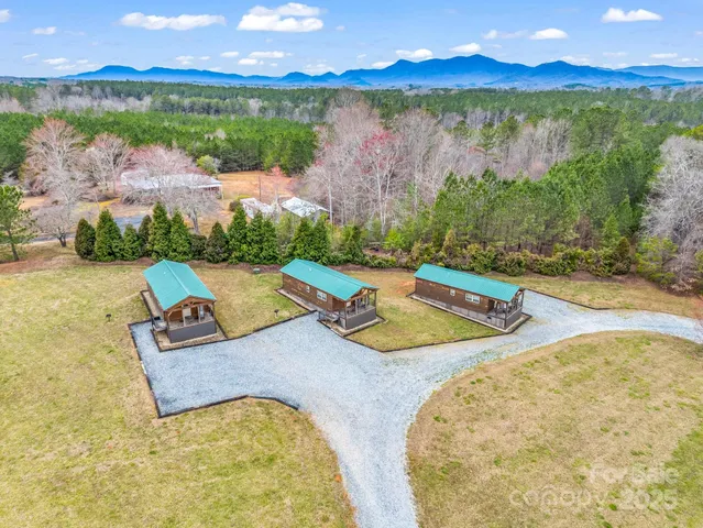 swimming pool view with a lake view