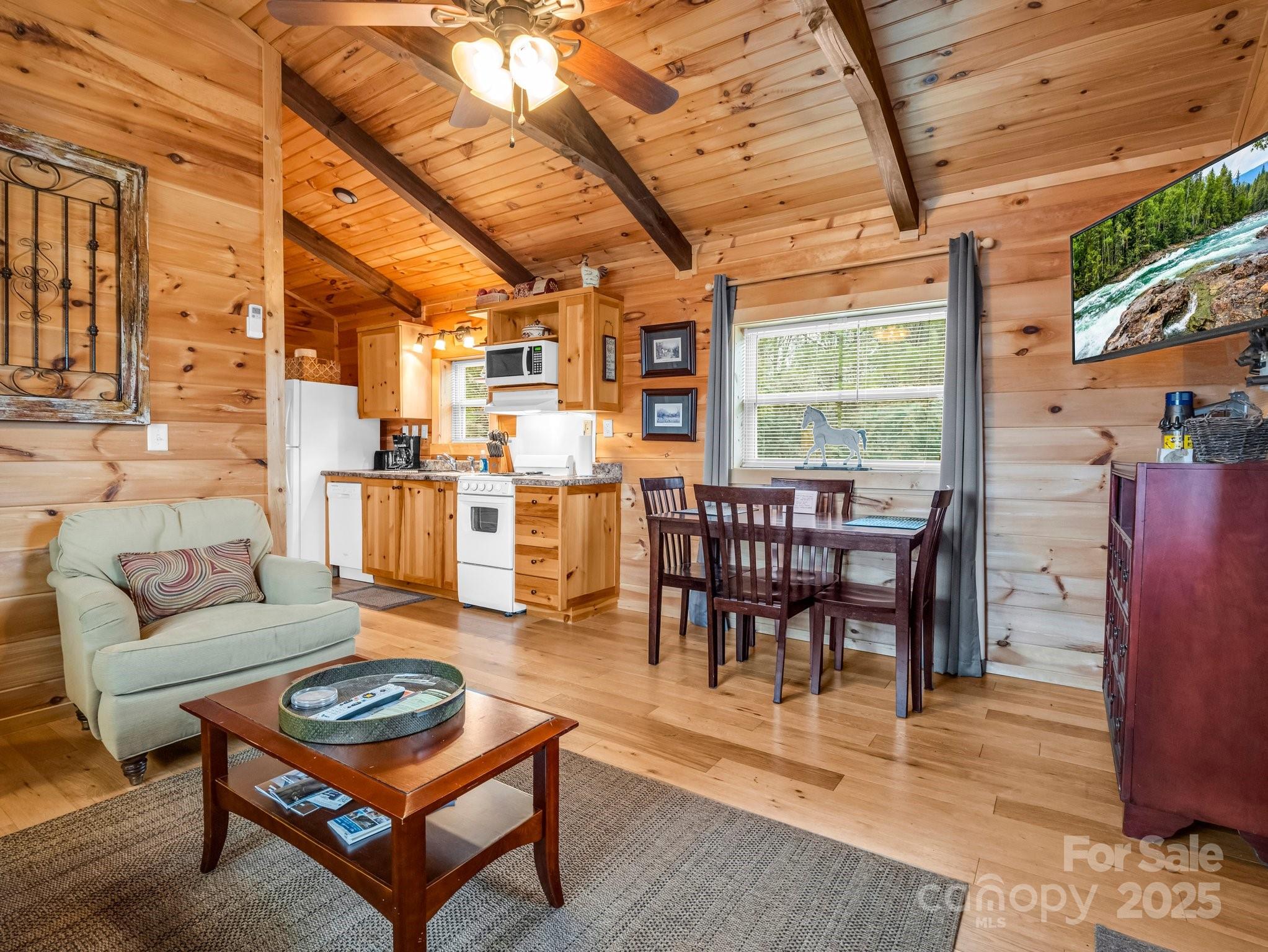1217 Moore Road, Unit 70 80 & 90 Tryon, NC 28782 - Photo 10 of 42 a living room with furniture and a large window