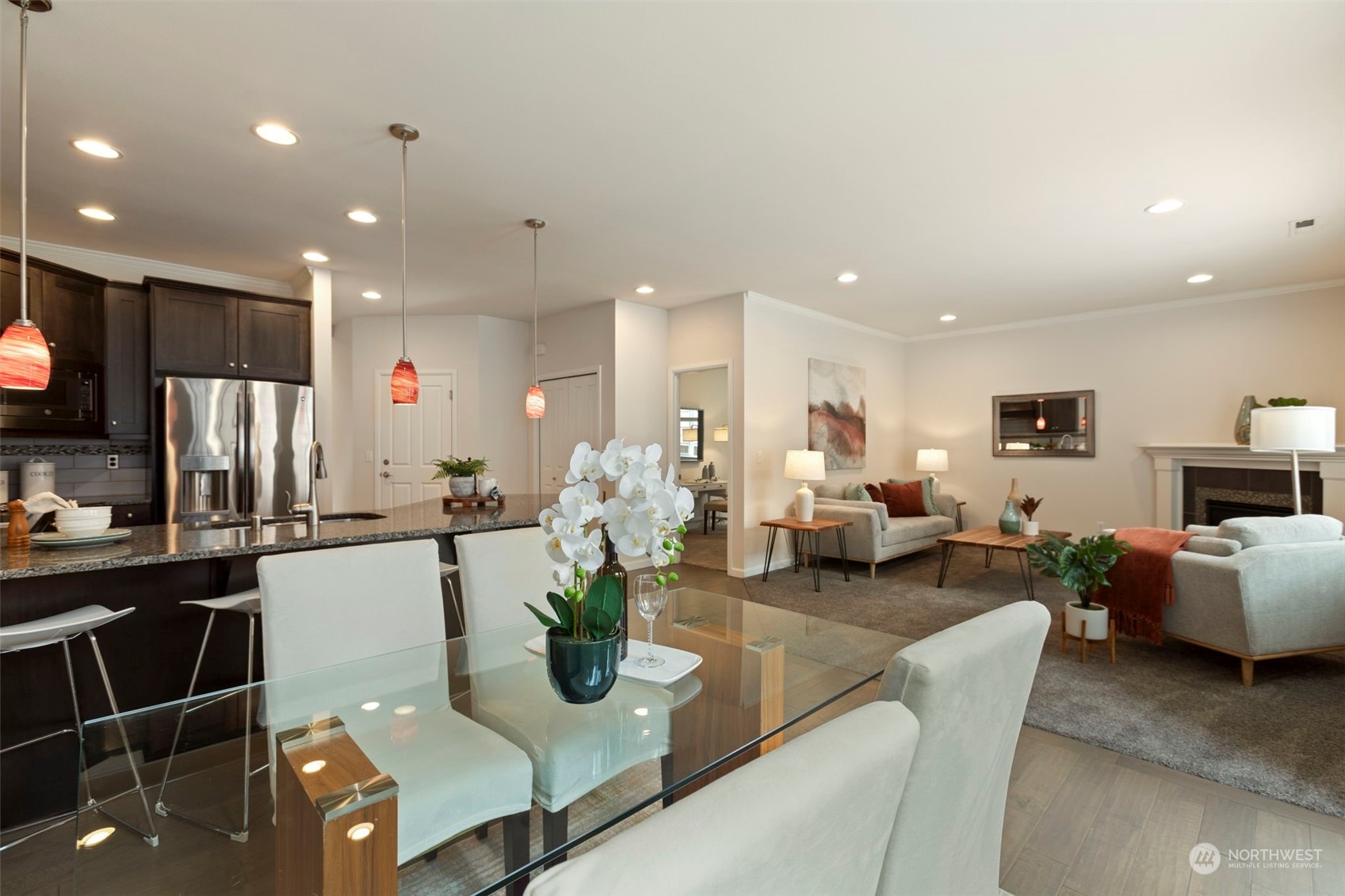 19529 34th Drive Southeast Bothell, WA 98012 - Photo 11 of 38 a living room with furniture kitchen view and a refrigerator