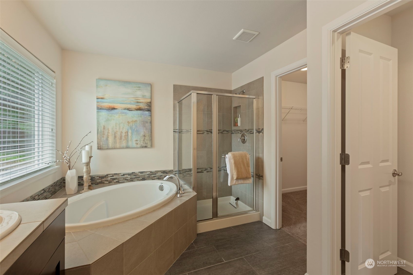 19529 34th Drive Southeast Bothell, WA 98012 - Photo 23 of 38 a bathroom with a tub and a shower