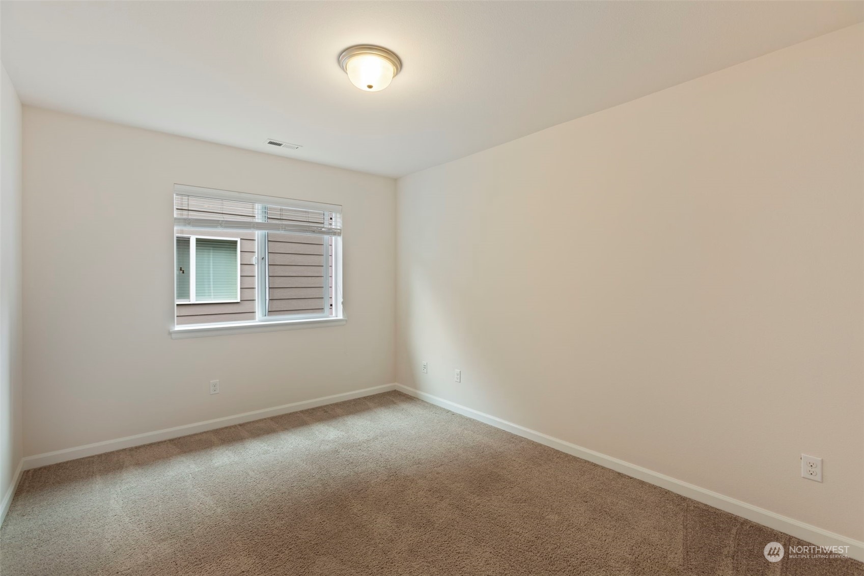 19529 34th Drive Southeast Bothell, WA 98012 - Photo 28 of 38 an empty room with a window