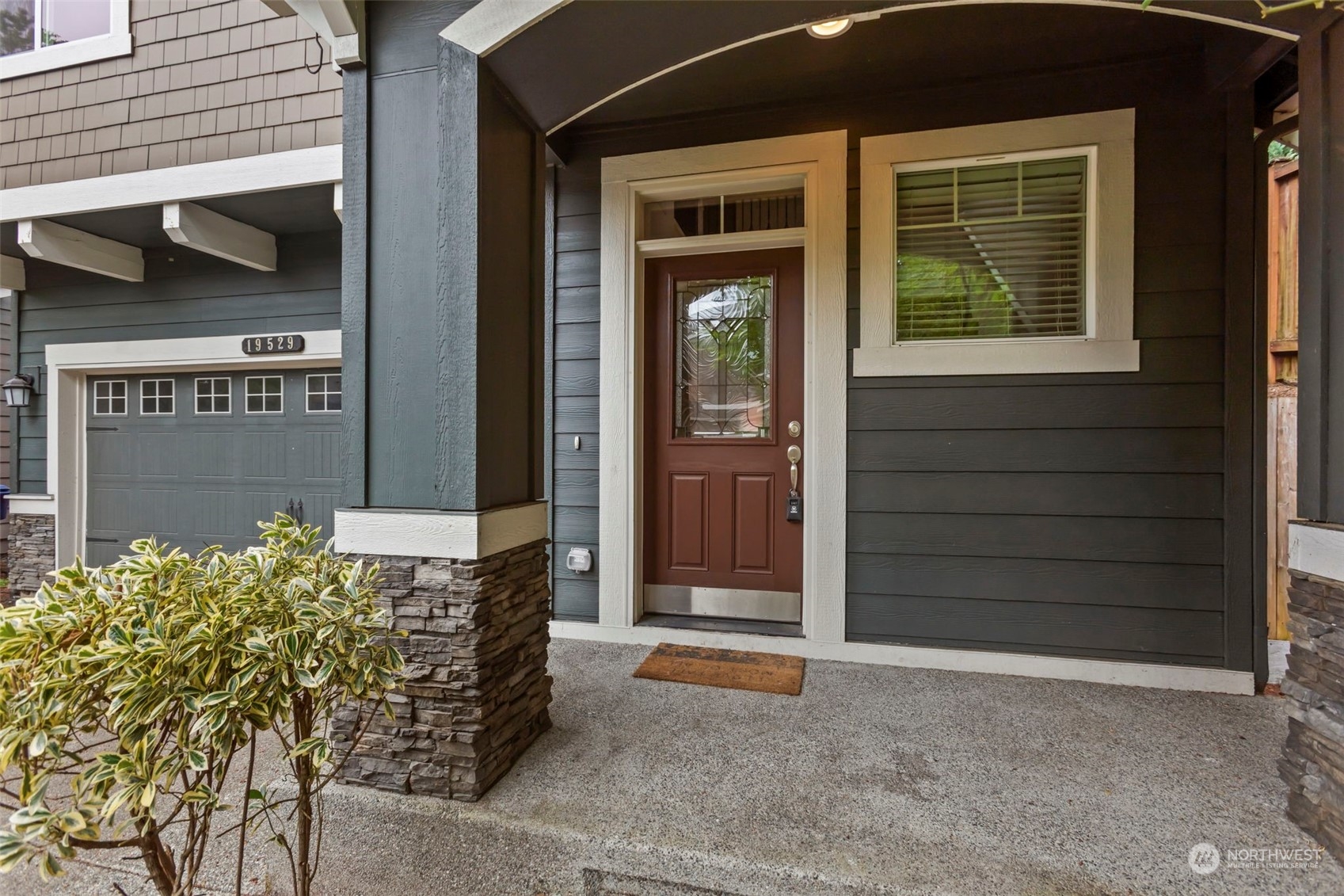 19529 34th Drive Southeast Bothell, WA 98012 - Photo 3 of 38 a front view of a house