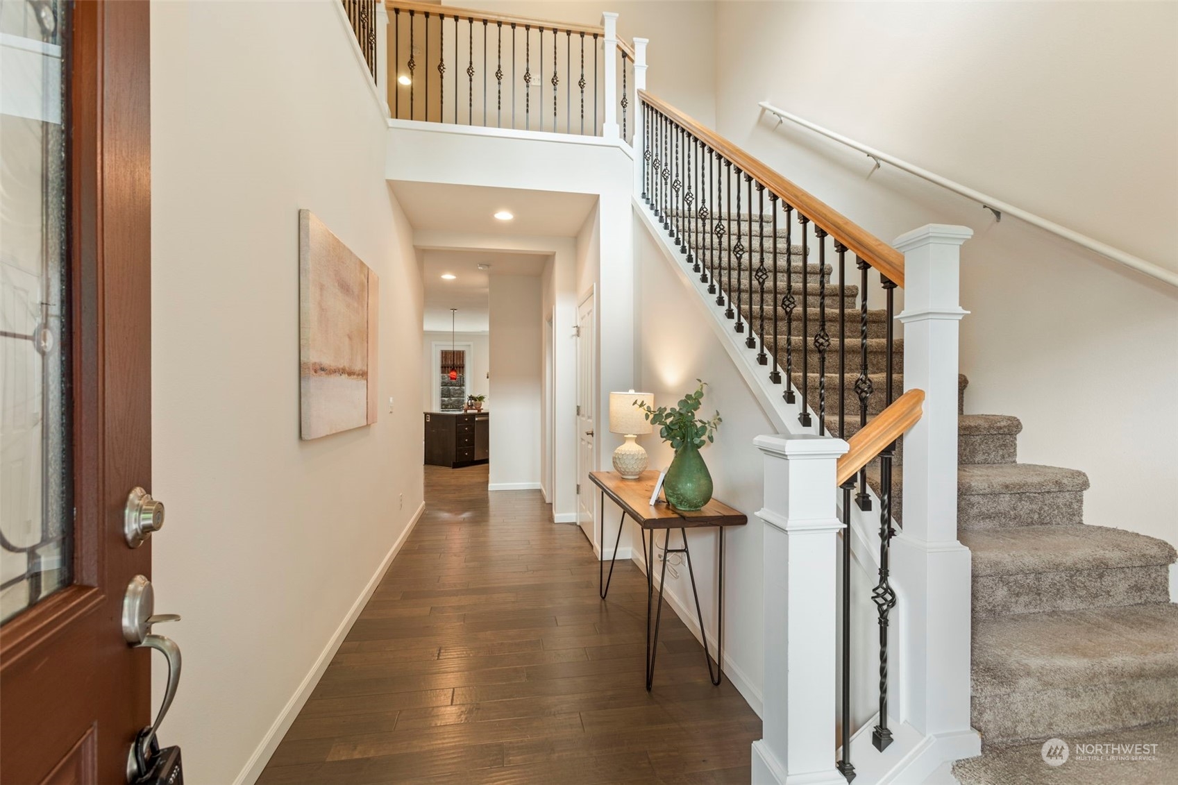 19529 34th Drive Southeast Bothell, WA 98012 - Photo 4 of 38 a view of entryway and hall with wooden floor