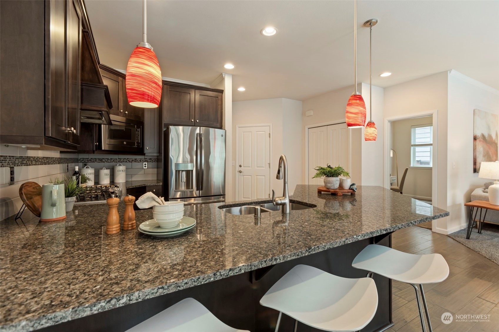 19529 34th Drive Southeast Bothell, WA 98012 - Photo 7 of 38 a kitchen with sink and a refrigerator