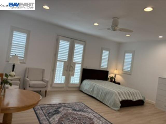 Gale Ranch San Ramon, CA 94582 - Photo 6 of 15 a bedroom with a large bed and a couch