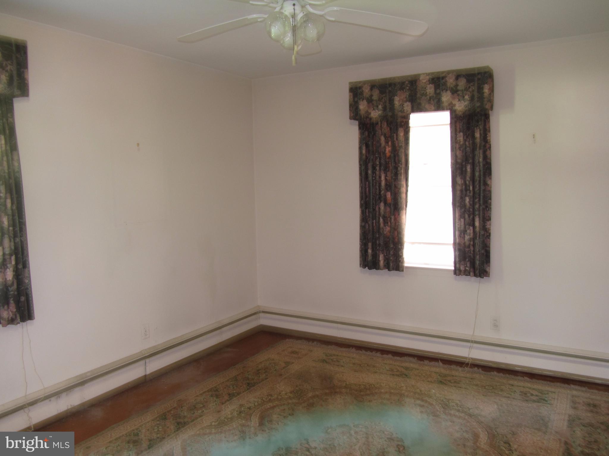 11802 Manor Road Glen Arm, MD 21057 - Photo 10 of 21 3rd Bedroom with Hardwood Flooring