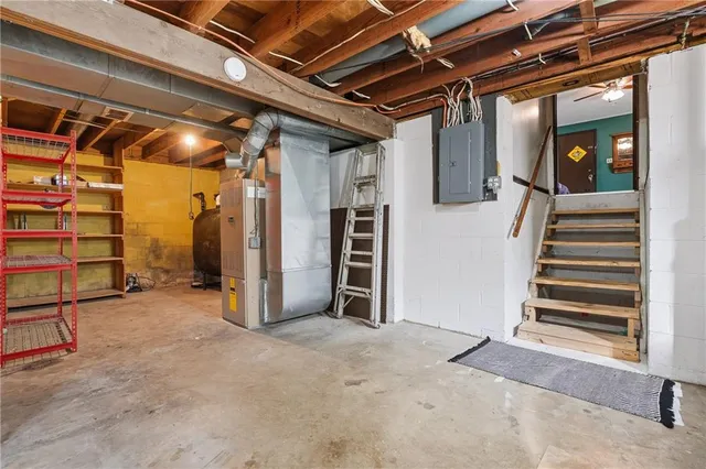 a view of an empty room with stairs