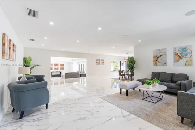 a living room with furniture and a couch