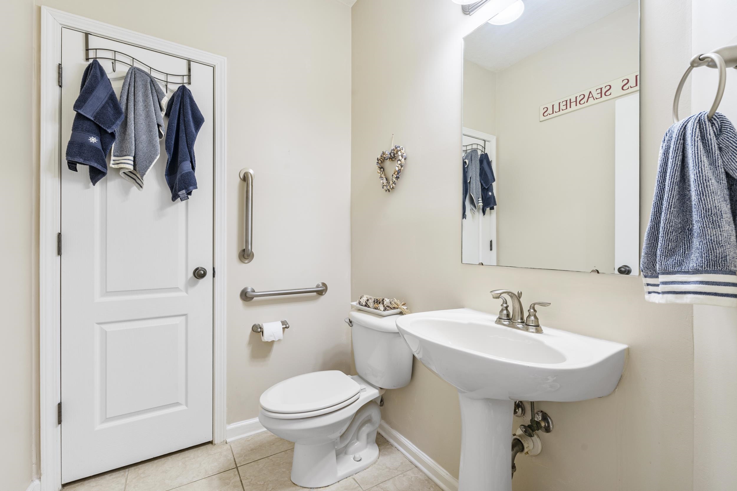110 Magnolia Crossing Point, Unit 1901 St. Augustine, FL 32086 - Photo 15 of 38 Bathroom with light tile patterned floors and toilet