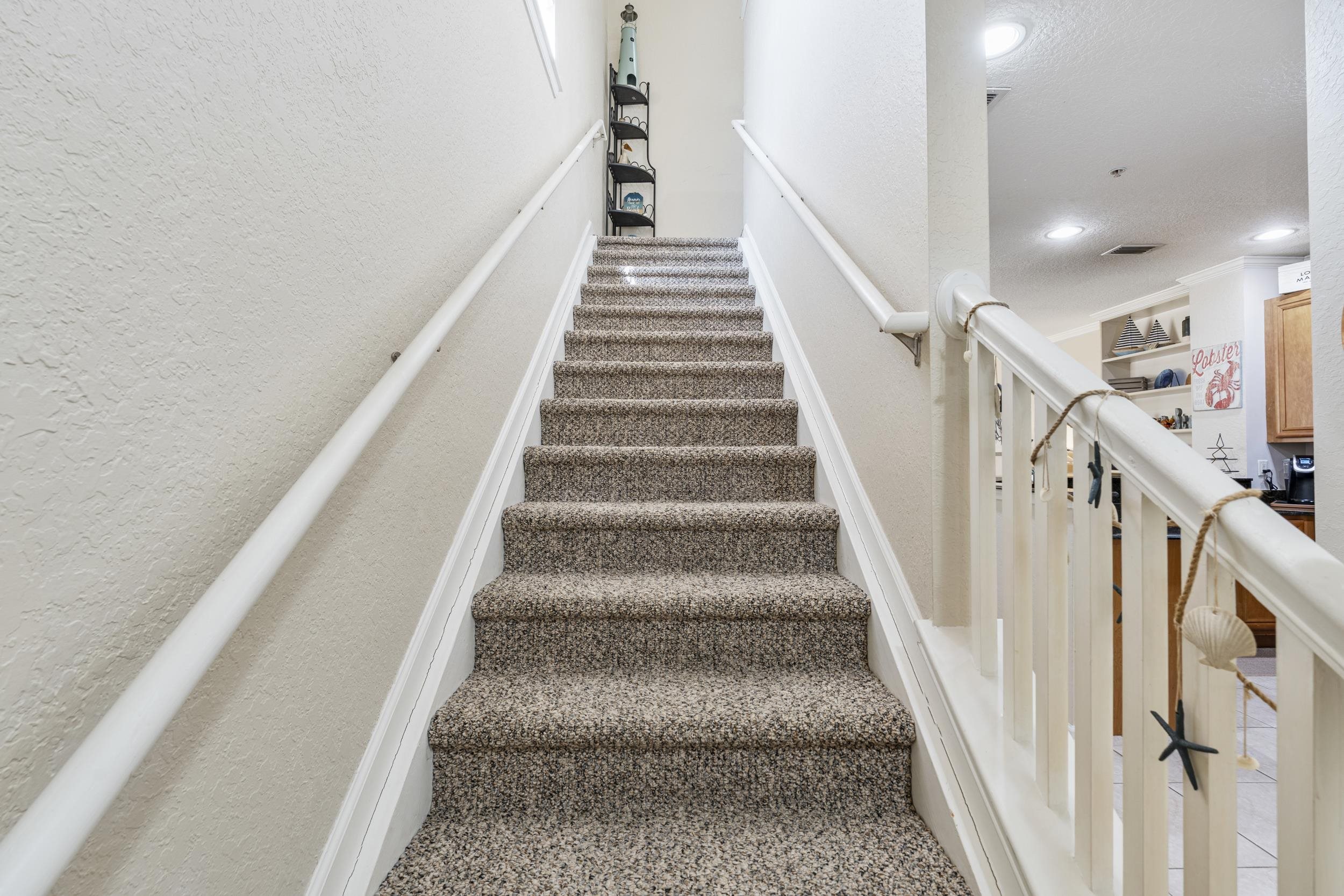 110 Magnolia Crossing Point, Unit 1901 St. Augustine, FL 32086 - Photo 16 of 38 Staircase featuring recessed lighting and a textured wall