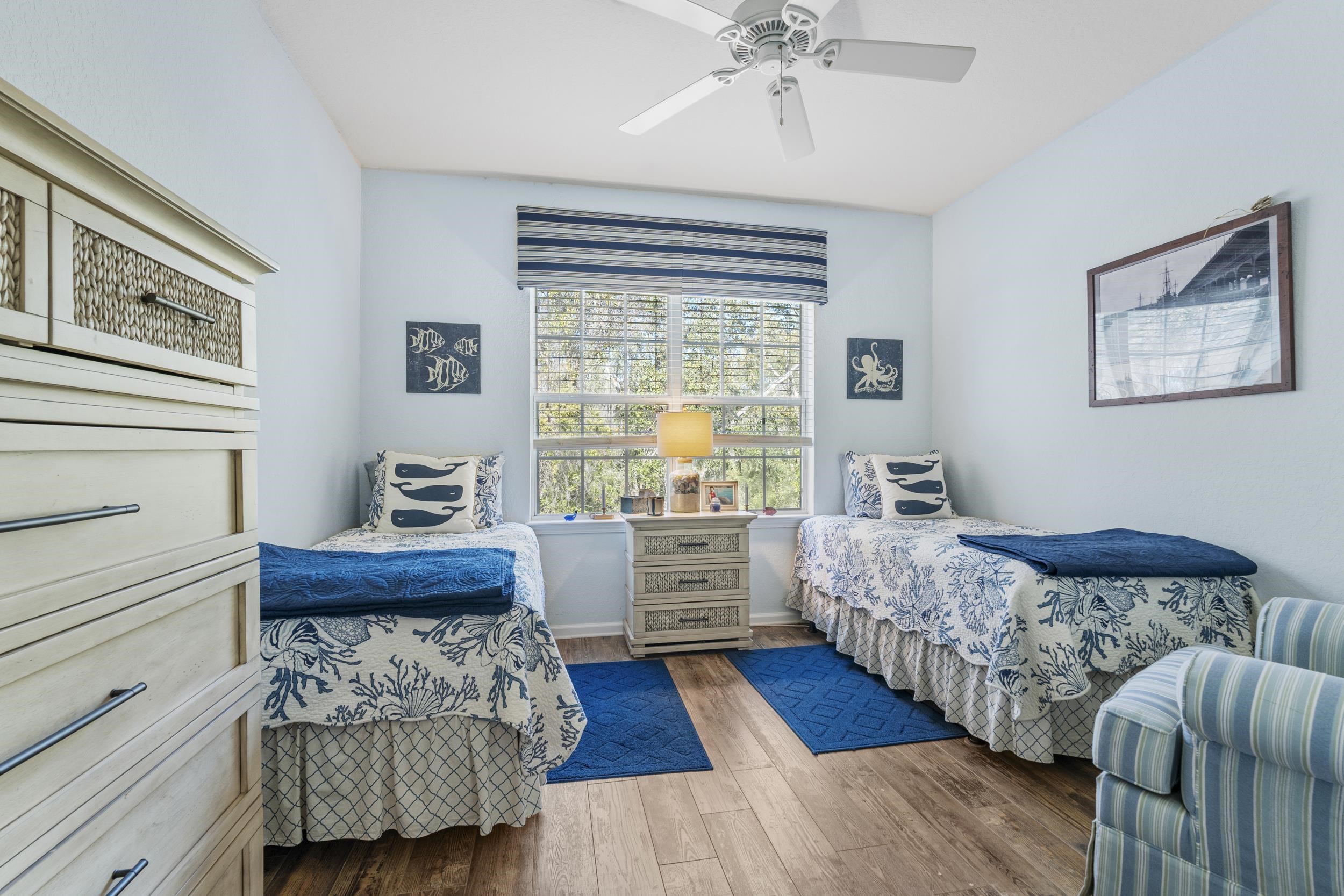 110 Magnolia Crossing Point, Unit 1901 St. Augustine, FL 32086 - Photo 21 of 38 Bedroom featuring wood finished floors and a ceiling fan