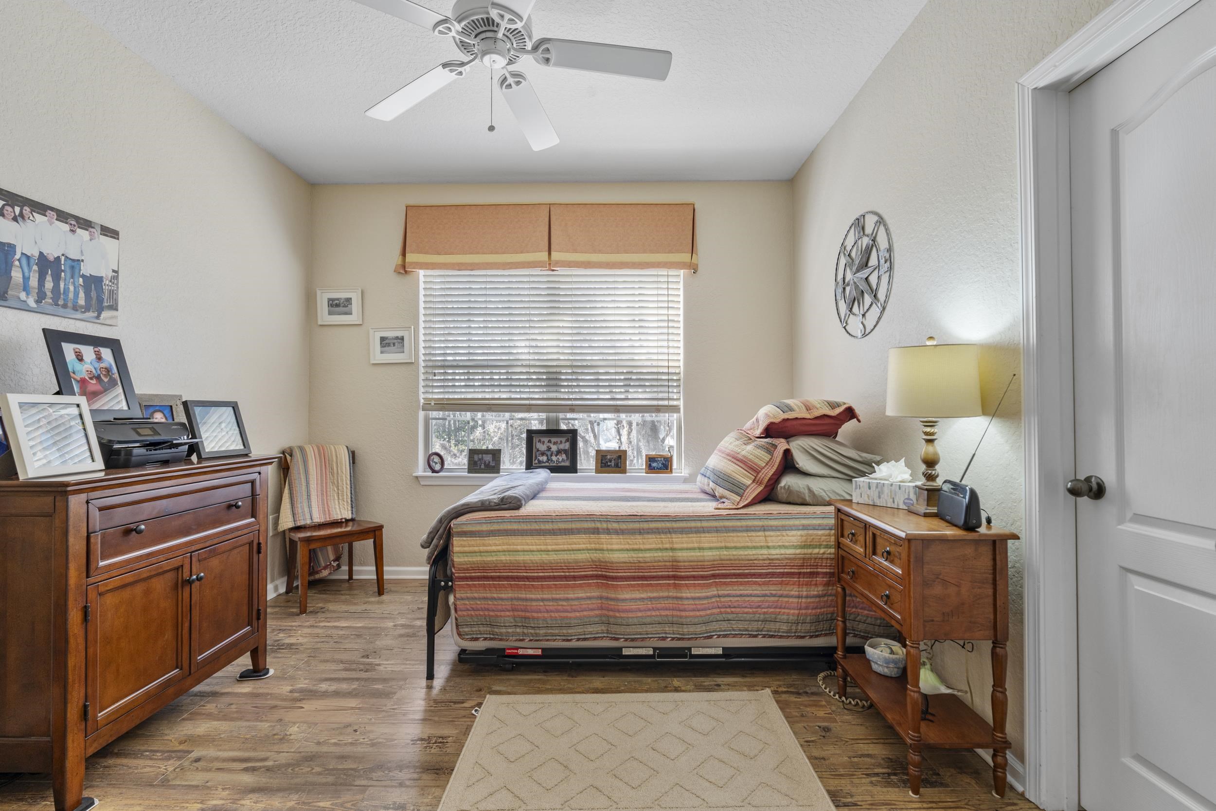 110 Magnolia Crossing Point, Unit 1901 St. Augustine, FL 32086 - Photo 24 of 38 Bedroom featuring light wood-type flooring and ceiling fan