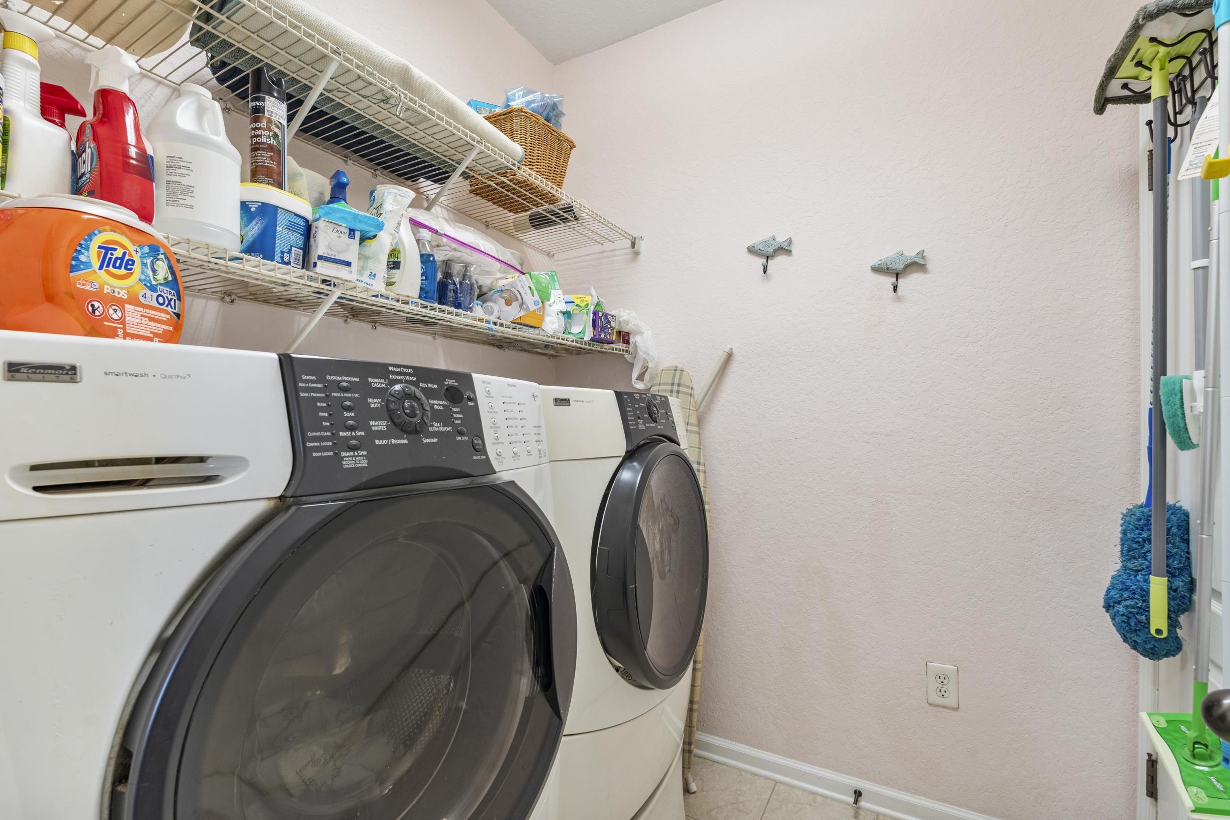 110 Magnolia Crossing Point, Unit 1901 St. Augustine, FL 32086 - Photo 25 of 38 Laundry room with independent washer and dryer and a textured wall