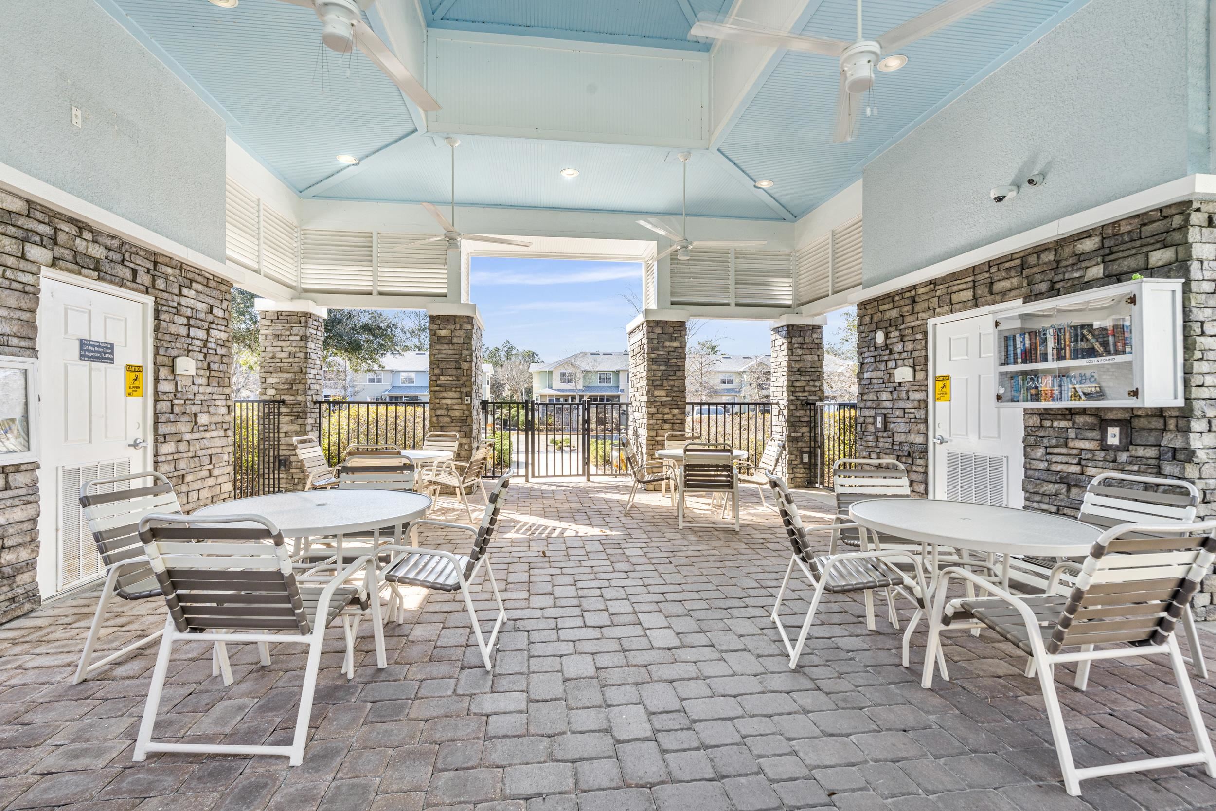110 Magnolia Crossing Point, Unit 1901 St. Augustine, FL 32086 - Photo 31 of 38 View of patio featuring outdoor dining space and ceiling fan