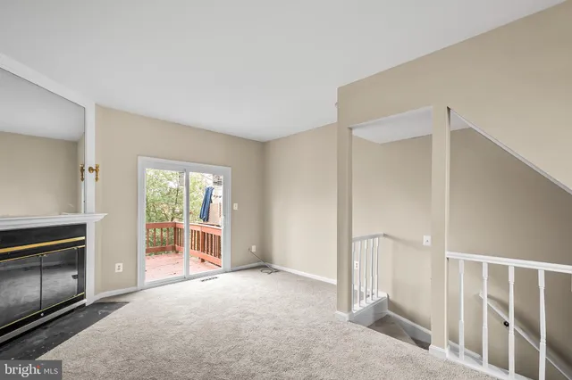 a view of a livingroom with a staircase