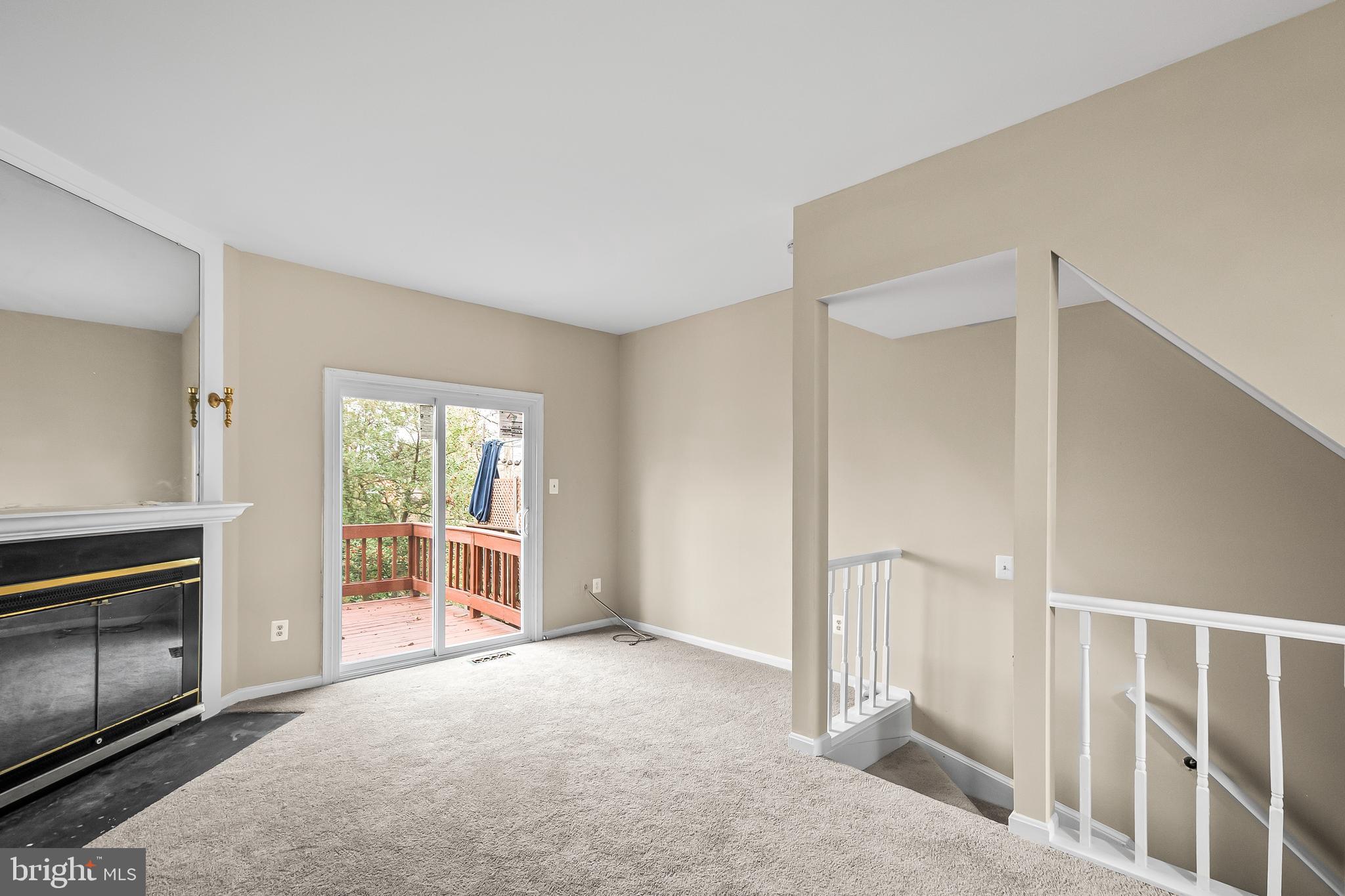 6185 Little Valley Way Alexandria, VA 22310 - Photo 13 of 44 a view of a livingroom with a staircase