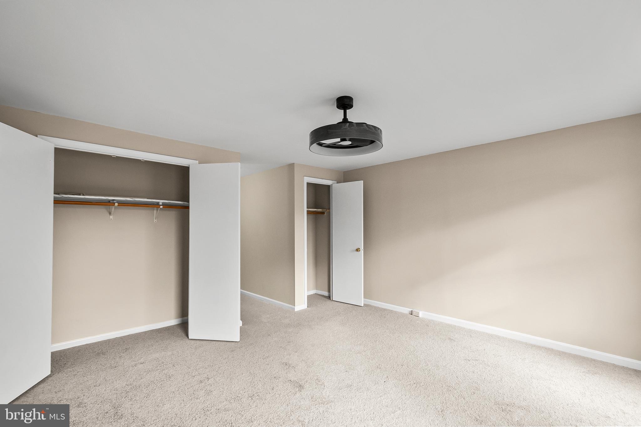 6185 Little Valley Way Alexandria, VA 22310 - Photo 27 of 44 a view of an empty room with a fan