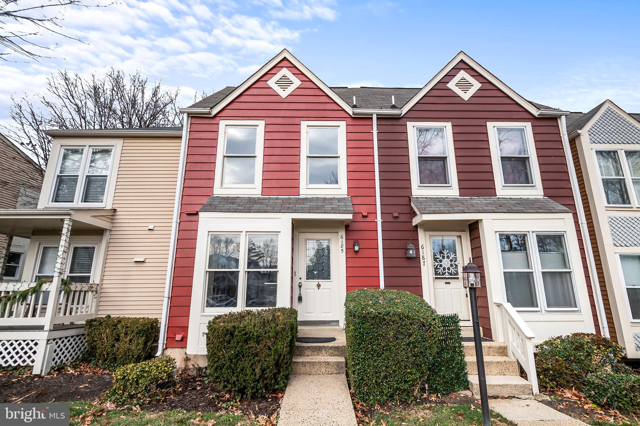 6185 Little Valley Way Alexandria, VA 22310 - Photo 4 of 44 front view of a house with a yard